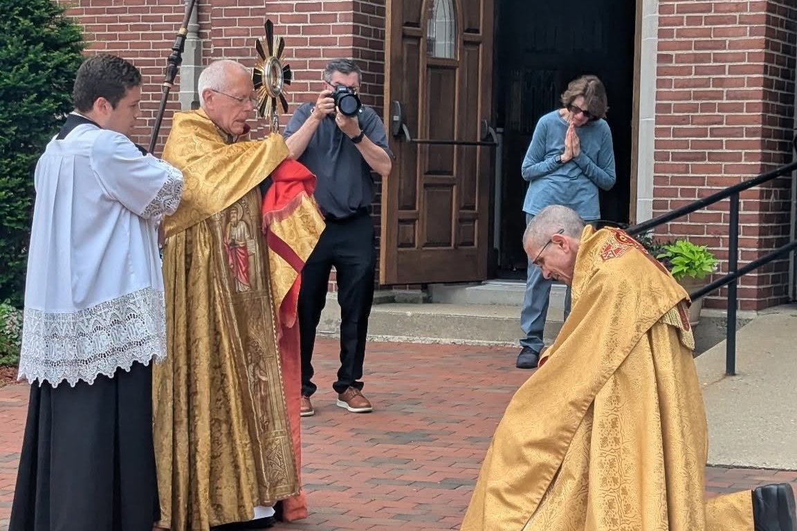 Bishop Libasci Blesses Bishop Ruggieri.