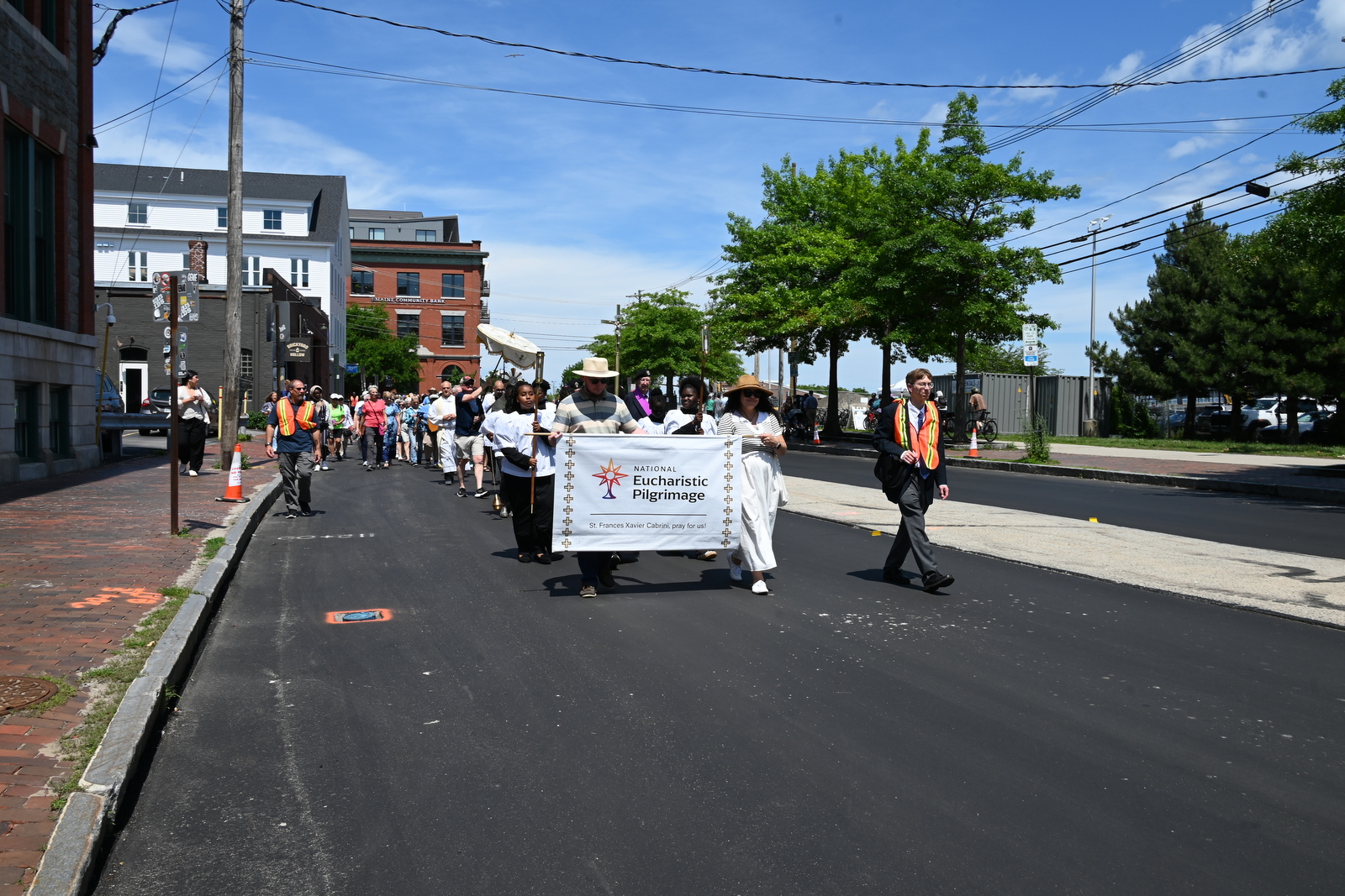 Procession Walking down Commerical Street in Portland