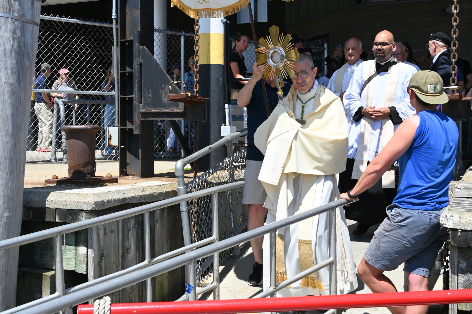 Bishop boarding ferry