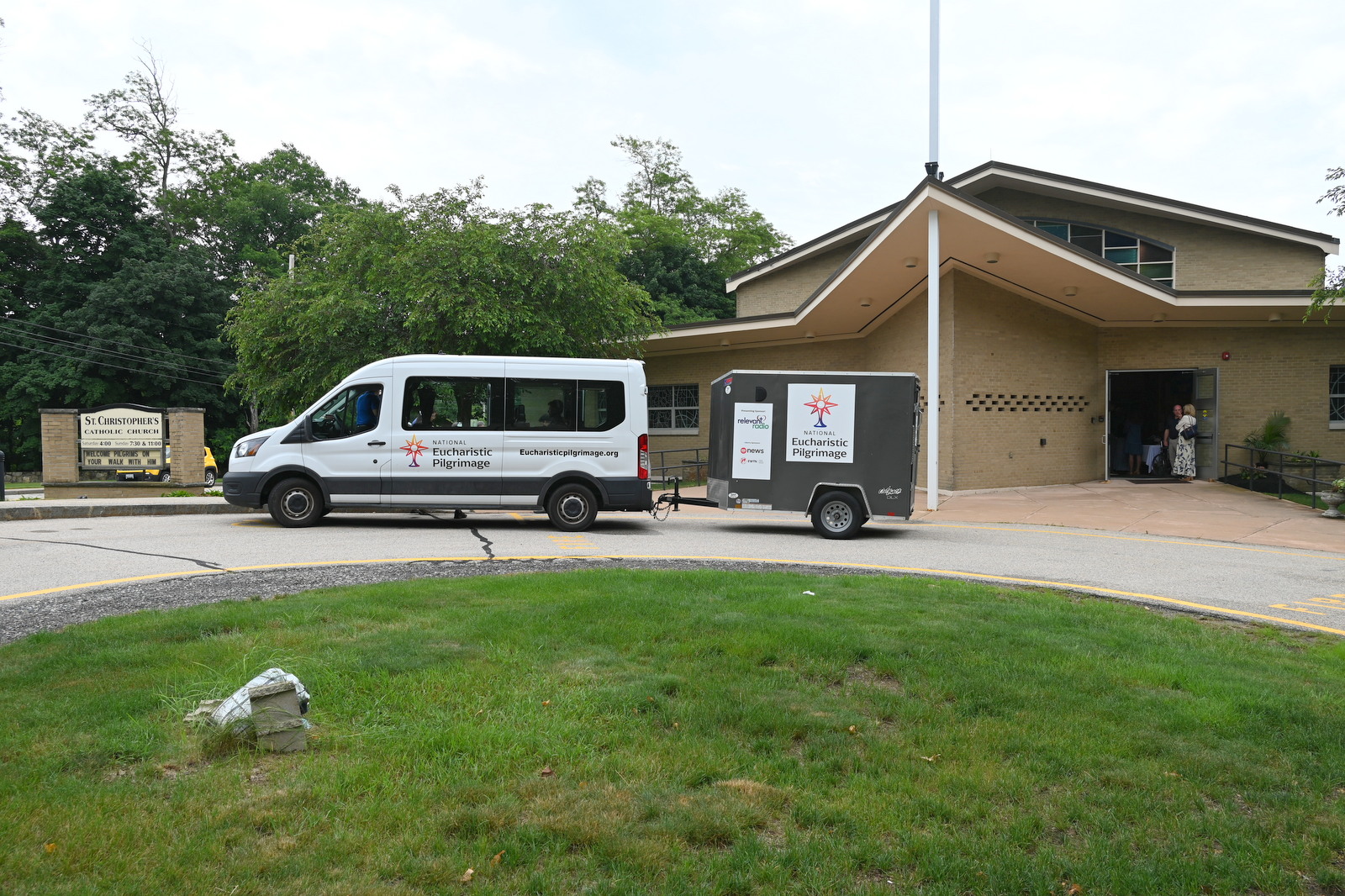 The pilgrimage van outside St. Christopher Church as it prepares to leave.