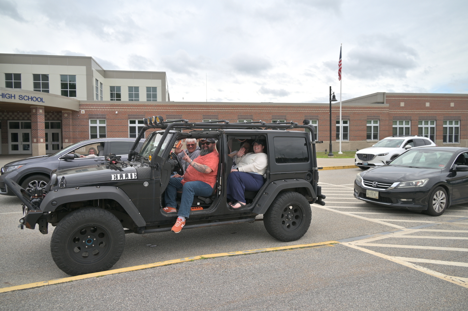 People in a jeep