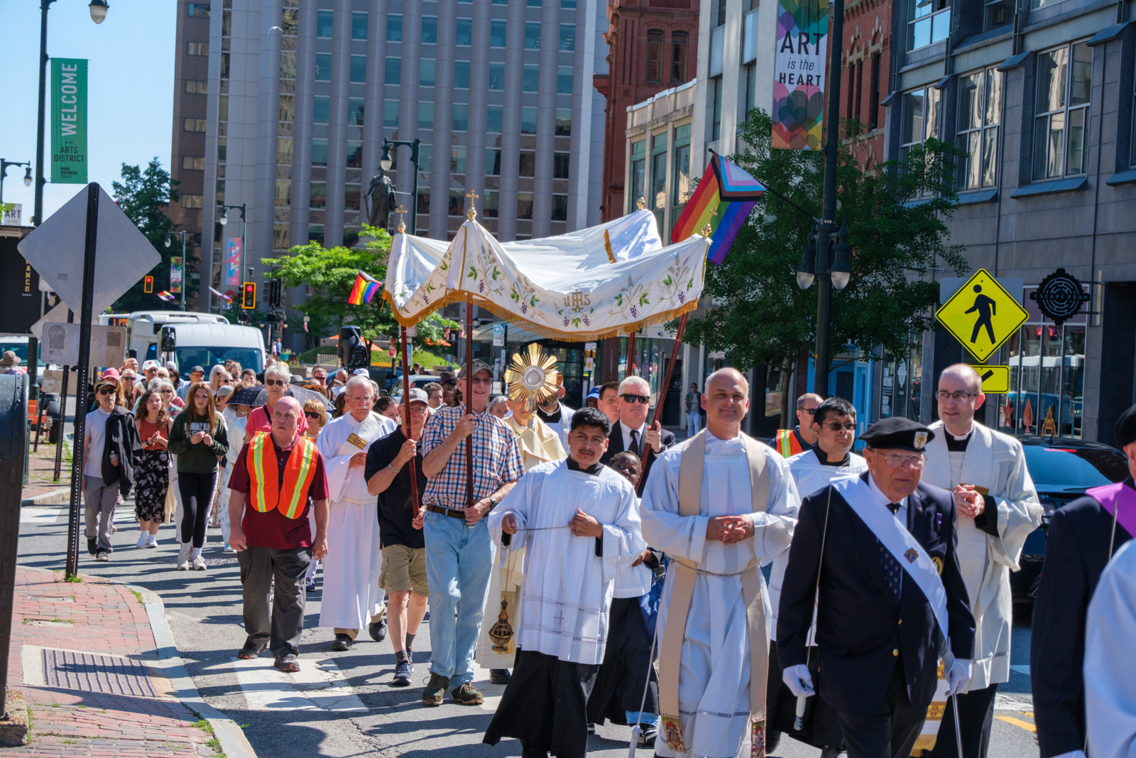 Procession heads to Sacred Heart Church in Portland.