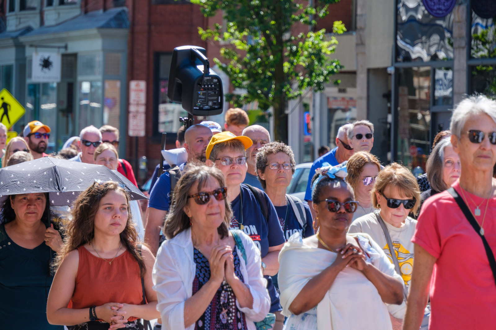 Closeup of people in procession