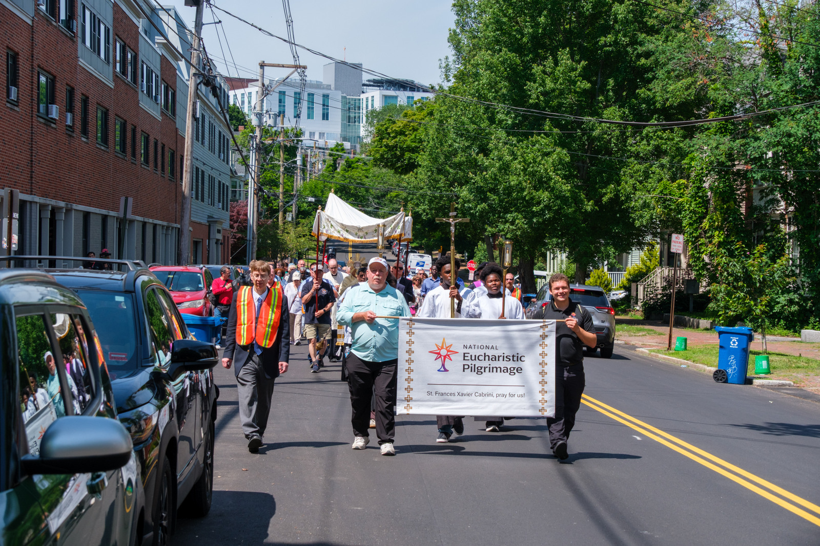 Procession heads towards the Cathedral of the Immaculate Conception in Portland.