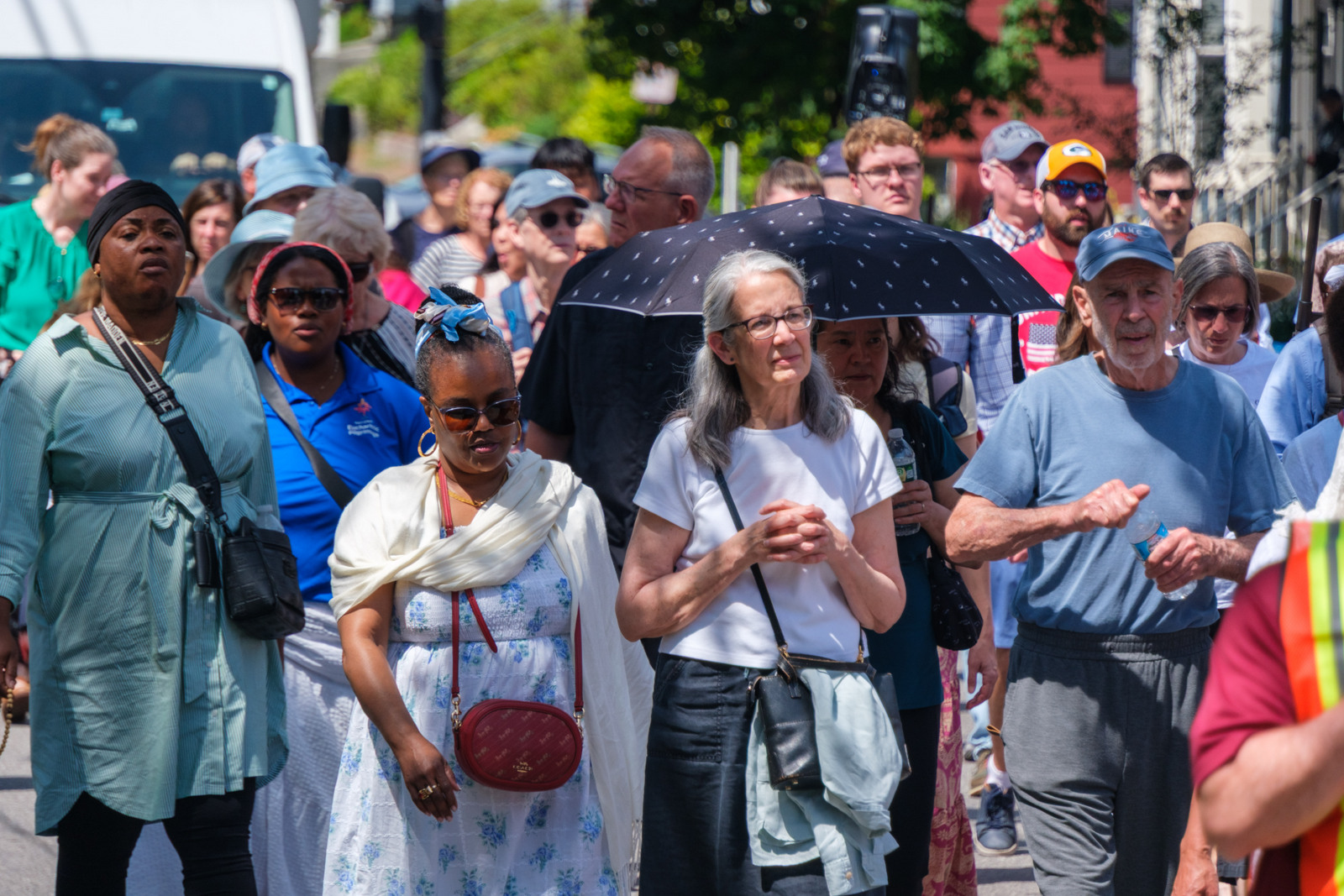 Procession heads towards the Cathedral of the Immaculate Conception in Portland.