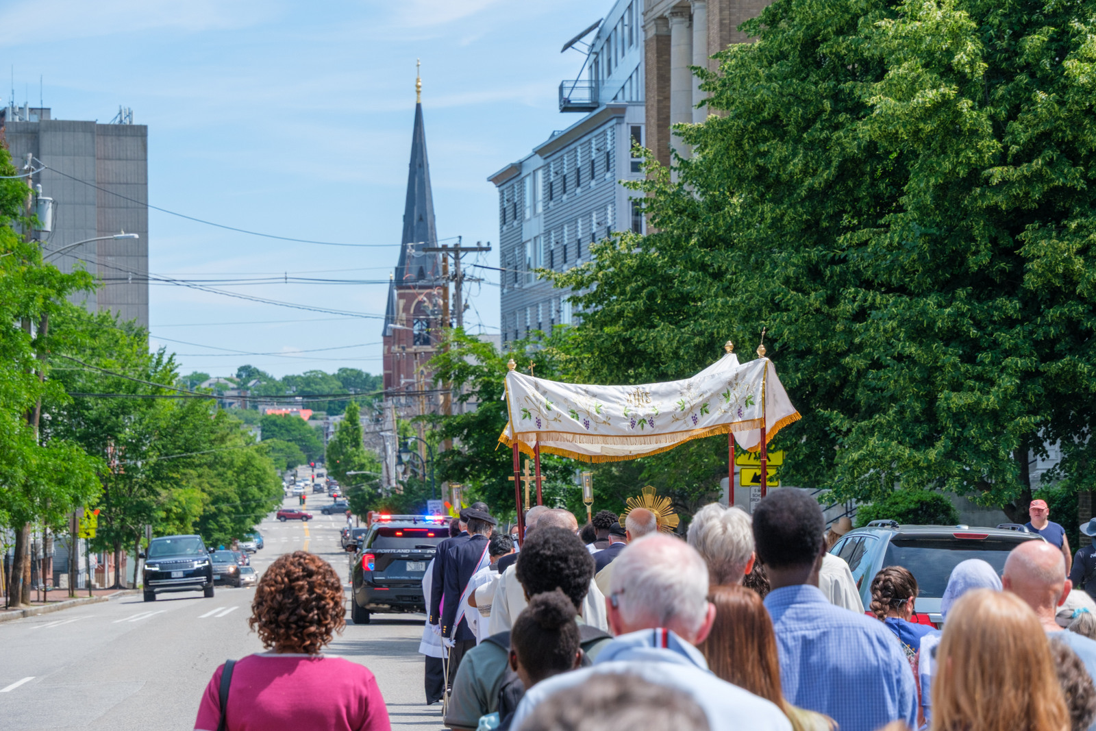Procession heads towards the Cathedral of the Immaculate Conception in Portland.