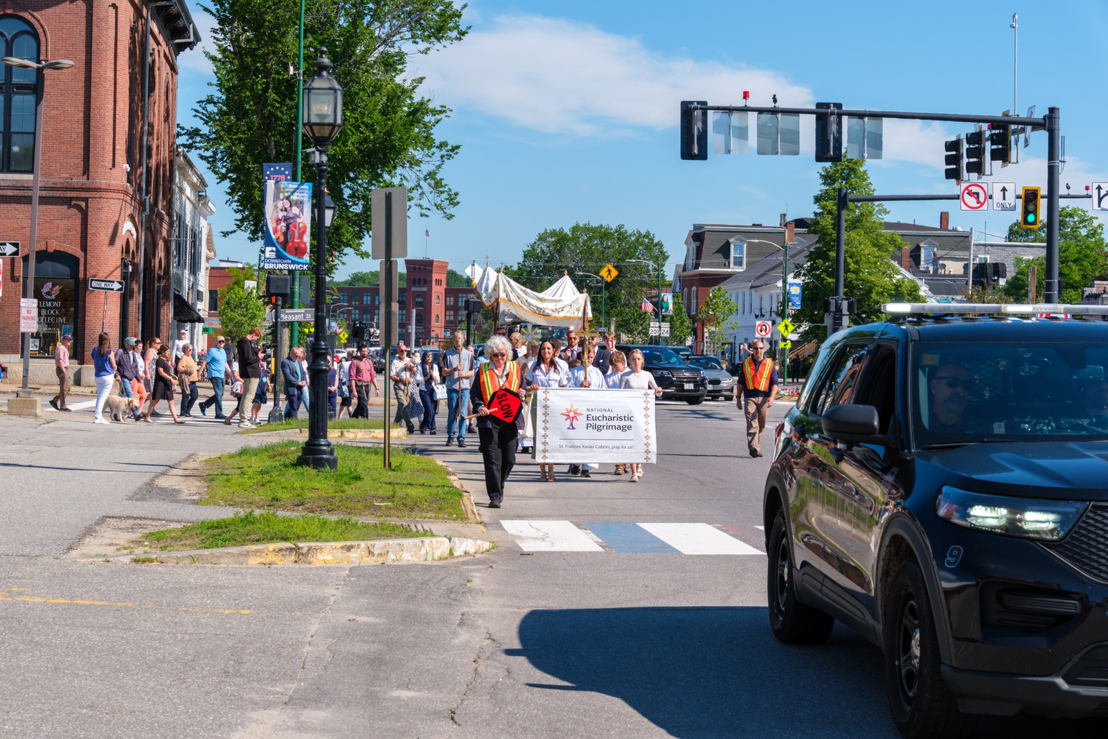 Eucharistic procession through the streets of Brunswick.