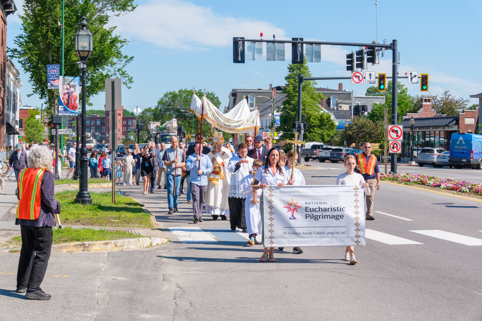 Eucharistic procession through the streets of Brunswick.