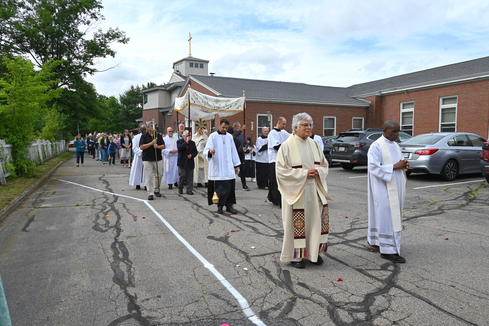Eucharistic procession around St. Martha Church in Kennebunk.