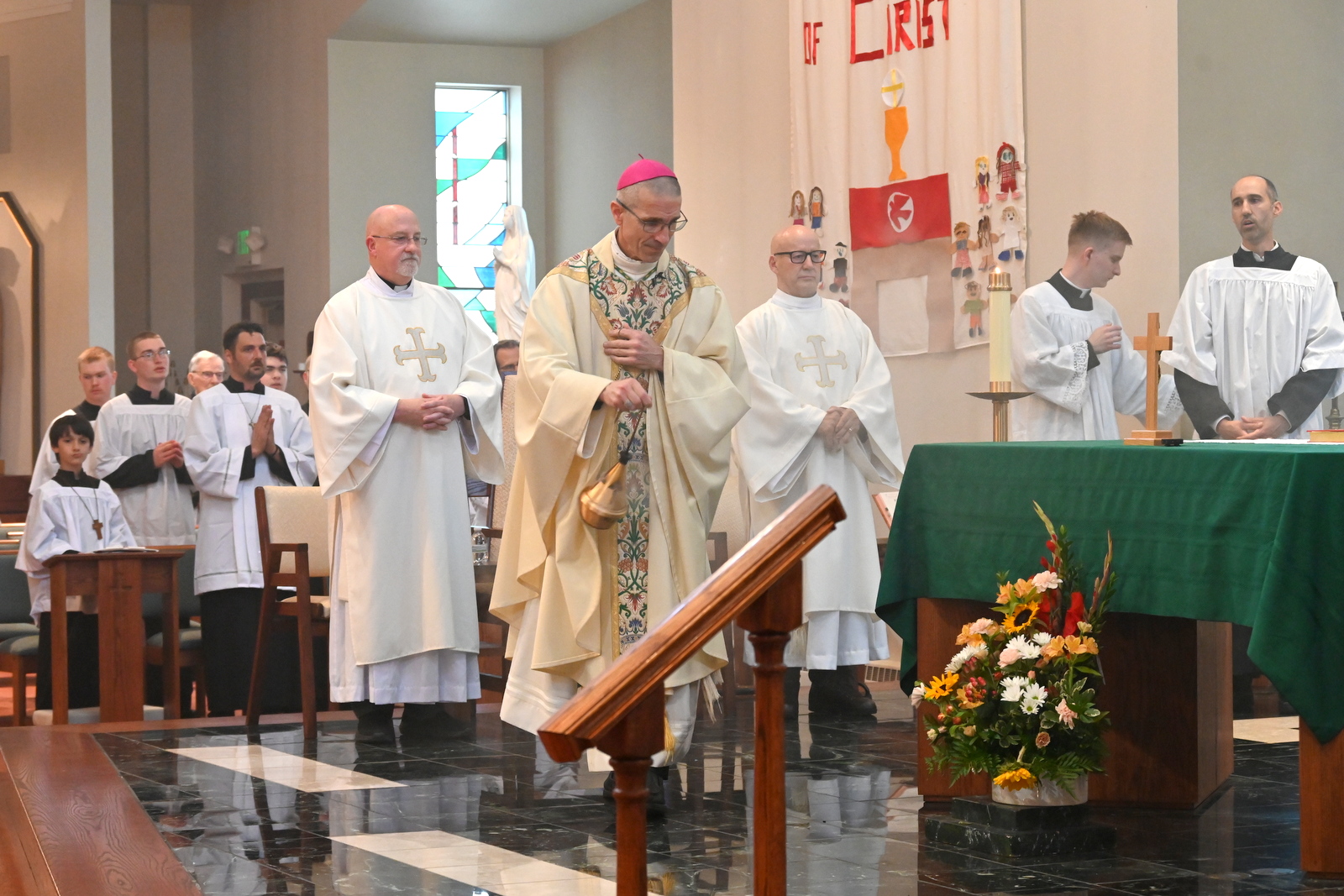 Bishop Ruggieri incenses the altar.