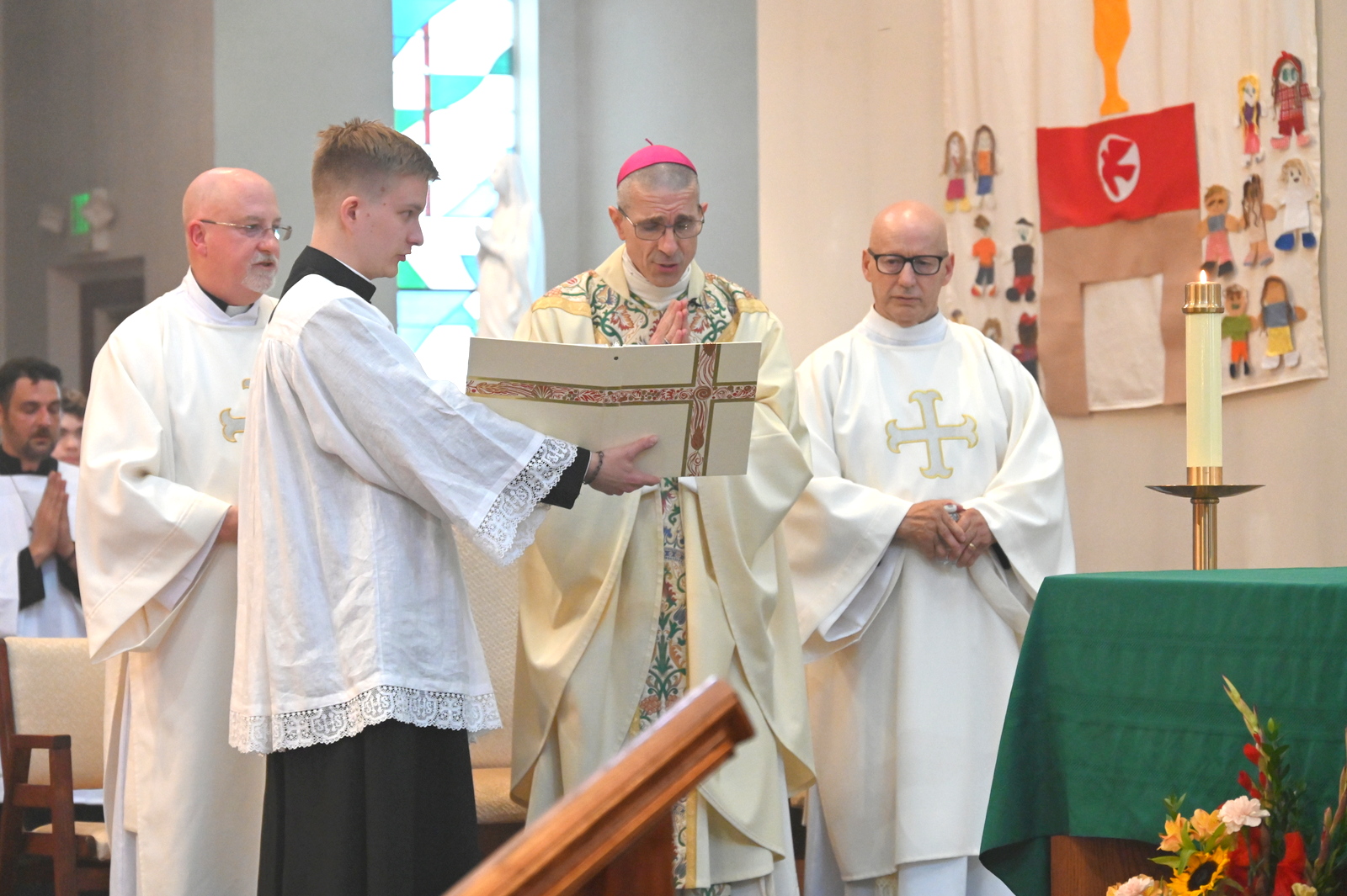 Bishop Ruggieri shares the opening prayer.