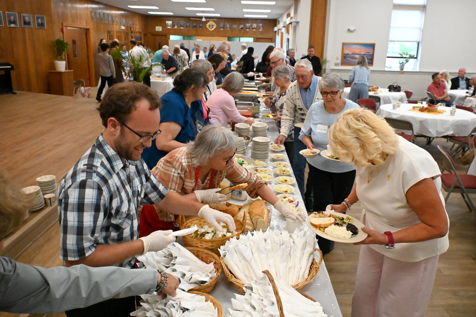 Serving food at the reception.