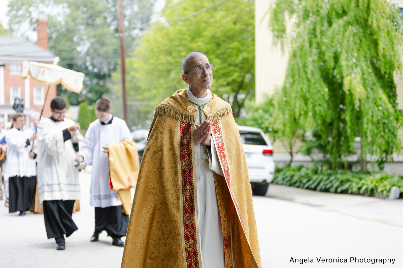 Bishop James Ruggieri walking in a procession.