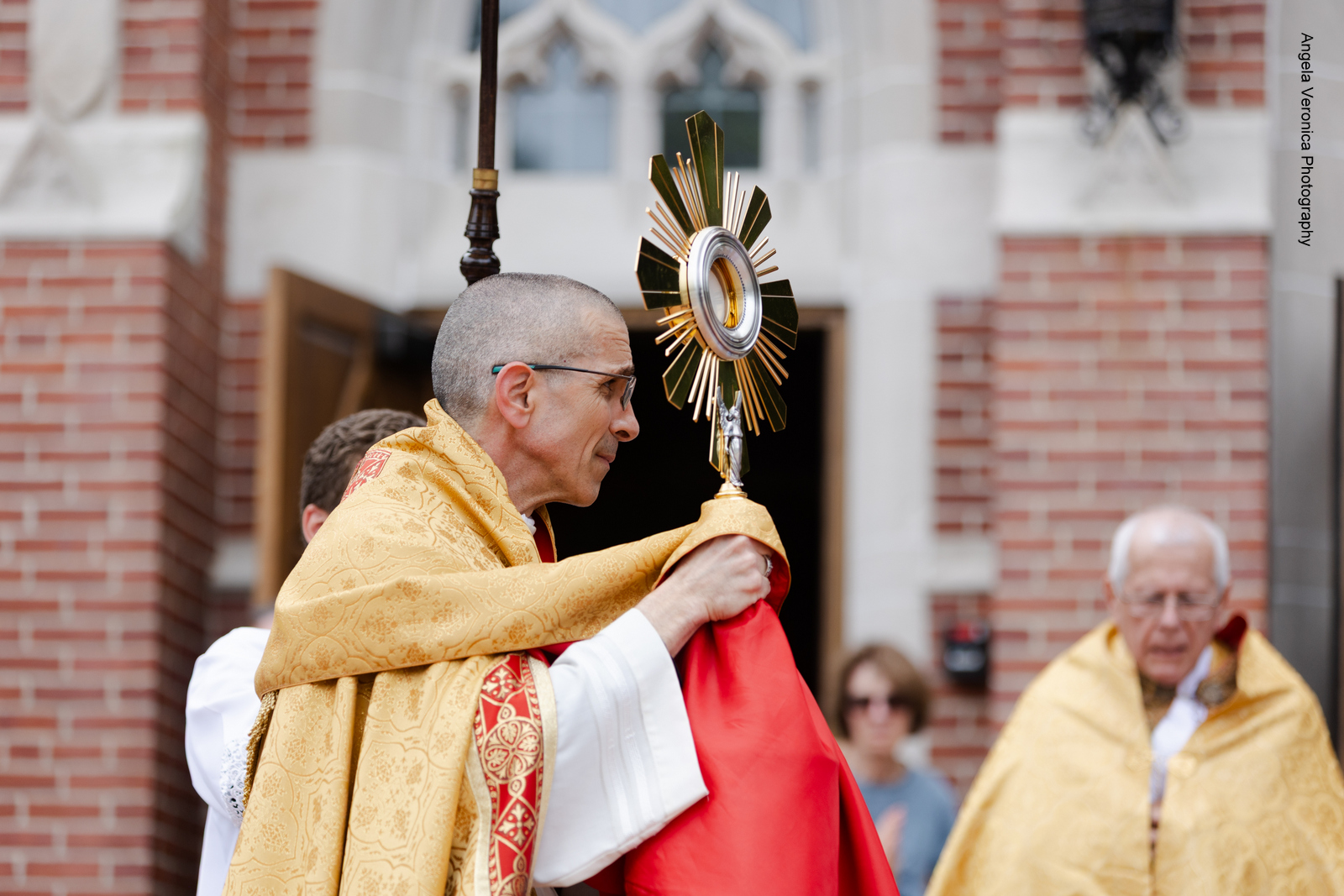 Bishop James Ruggieri walking in a procession.