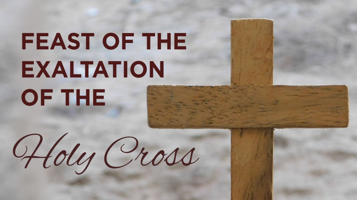 Wooden Cross over cloudy sky