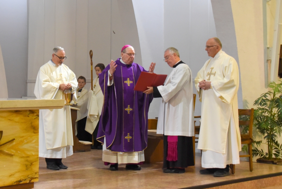 Bishop Robert Deeley gives the opening prayer.
