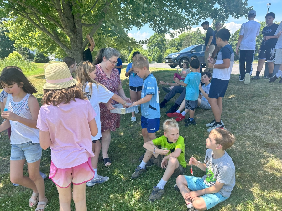 campers eating popsicles