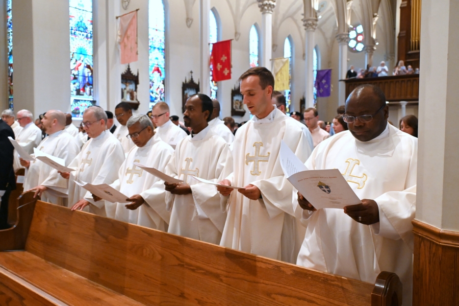 Priests in the pews