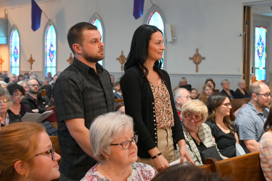 Two people standing