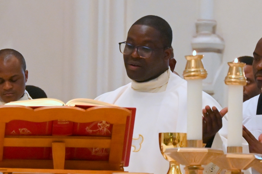 Father Yongyee joins in the celebration of the Eucharist.