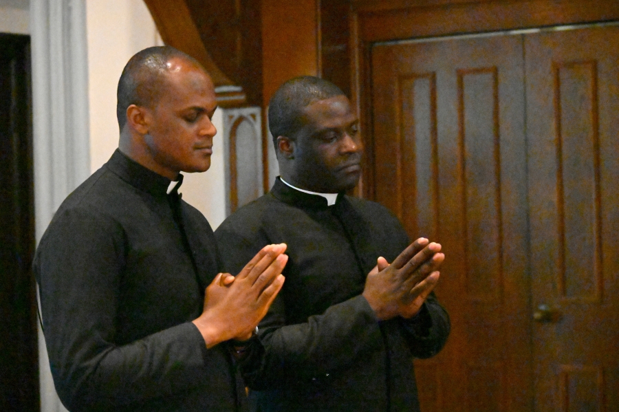 Deacons Ezekiel Yisi and Evans Yongyee