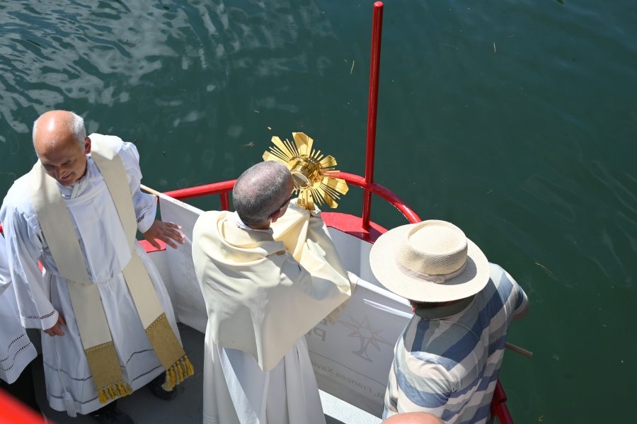 Bishop Ruggieri in the bow of the ferry to Peaks Island