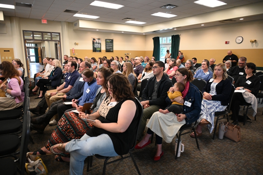 Conference attendees seated