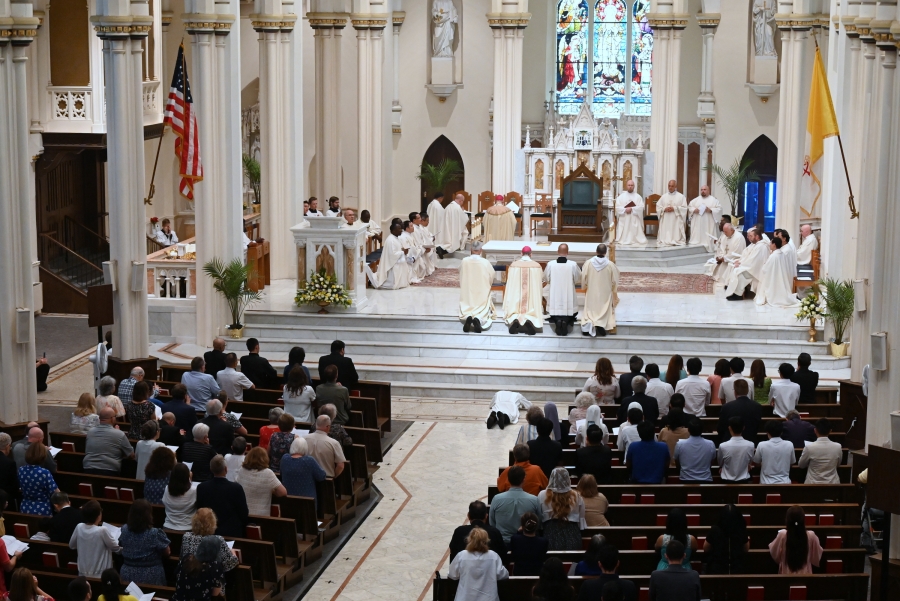 Vinh Nguyen laying prostrate as seen from the balcony