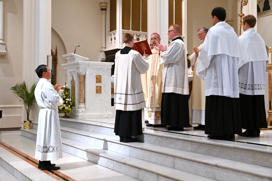 Bishop Ruggieri prays the Prayer of Ordination.