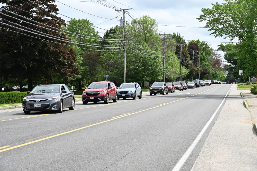 Car procession line of cars
