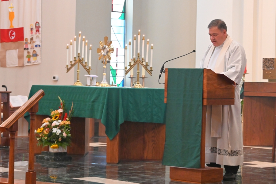 Father Edward Clifford delivers a reflection.