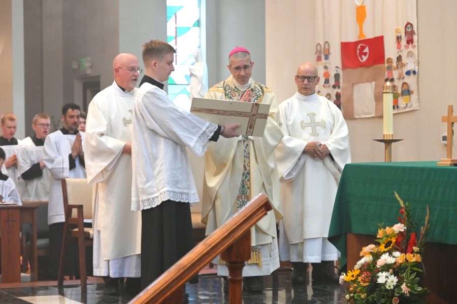 Bishop James Ruggieri reads the opening collect.