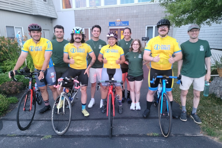 Five cyclists and the four-member support team.