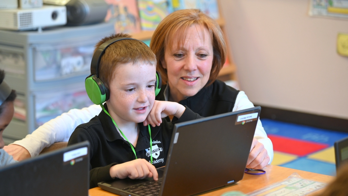 Ann Slonina with a student
