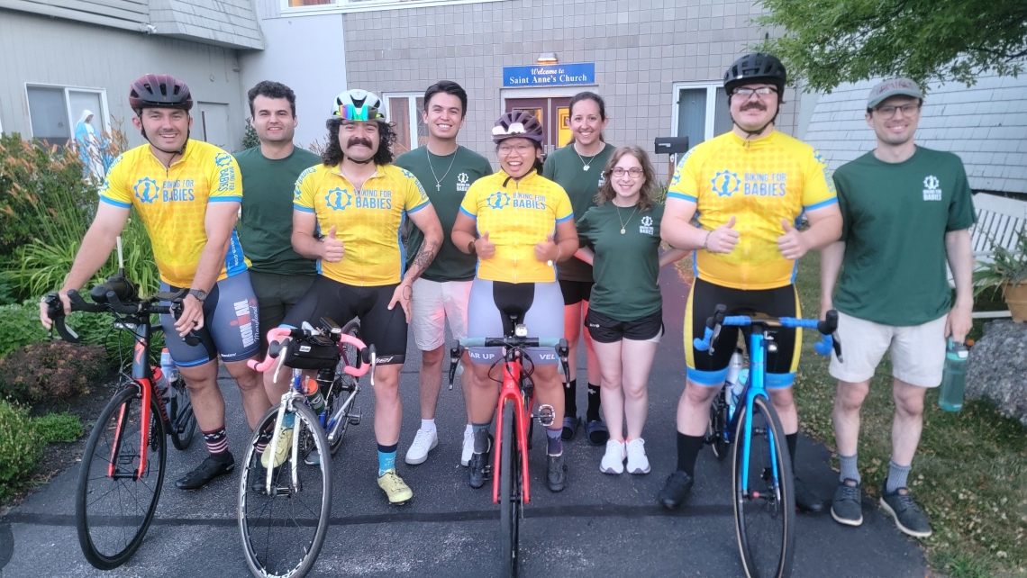 Five cyclists and four members of the support team.