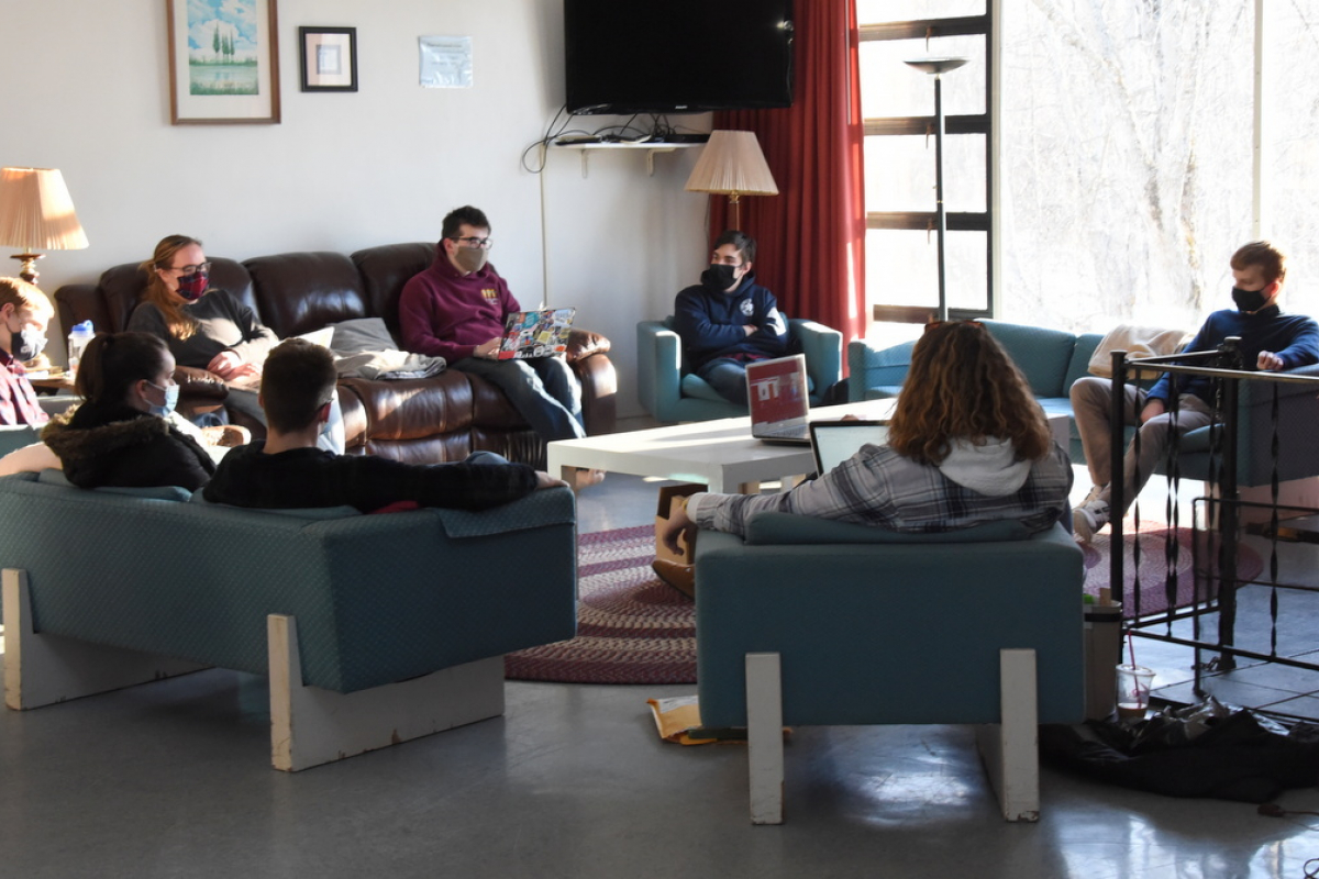 Students gathered at the Newman Center in Orono