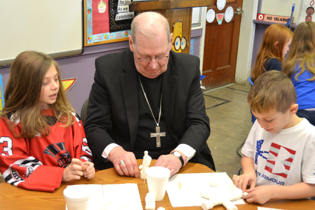 Bishop Deeley visits St. Dom's Lewiston campus during Maine Catholic Schools Week.